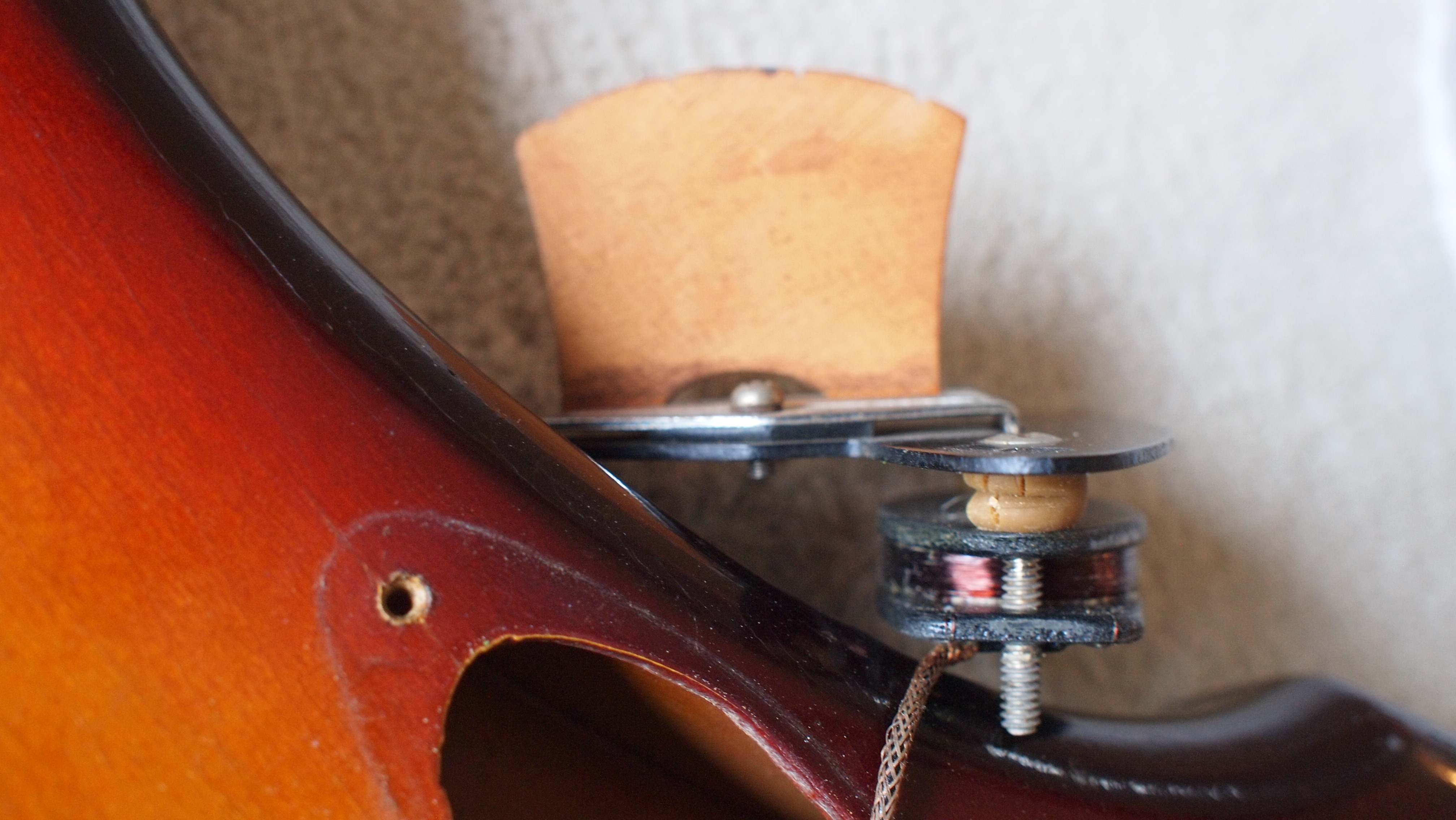 unique pickup device inside an old 1958 Fender